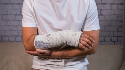 man with broken arm, distal radius fracture