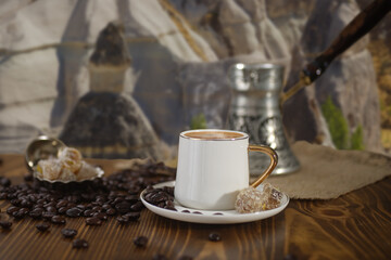 a cup of hot turkish coffee in the background cappadocia