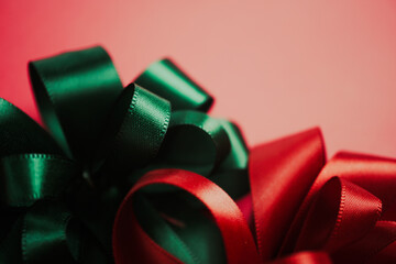 Bright red and green ribbon for Christmas and new year concept background