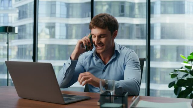 Cheerful businessman talking rejoicing success closeup. Man communicating phone