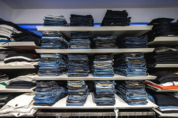 Close up view of cells with jeans in clothing store