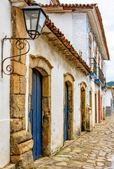 Details of the houses and their colonial architecture in the historic streets with cobblestones in the city of Paraty, coast of Rio de Janeiro