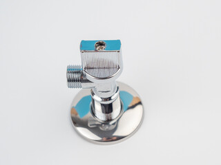 Water faucet on a white background. Water faucet close-up.