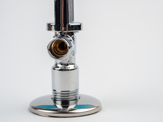 Water faucet on a white background. Water faucet close-up.