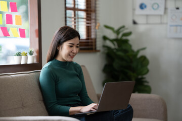 Fototapeta premium Portrait of successful business woman against a window.