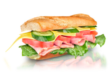 Ham and cheese salad submarine sandwich from freshly cut baguette