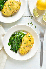 Baked turmeric chicken breast and sauteed spinach