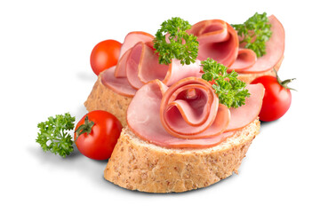 Jamon. Slices of Bread with Spanish Serrano Ham Served as Tapas. Cured ham, spanish appetizer. Prosciutto isolated on white background