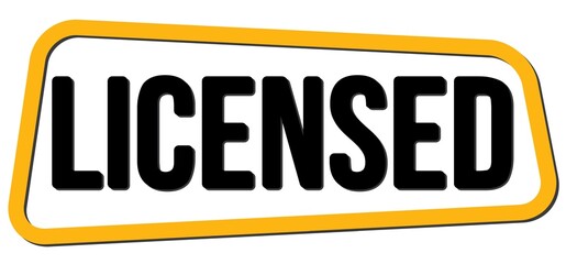 LICENSED text on yellow-black trapeze stamp sign.