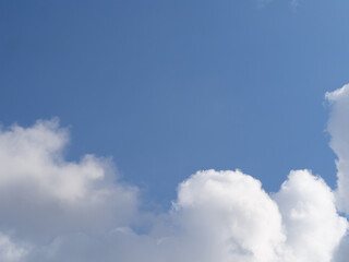 White Cloud and Blue Sky. Beautiful white clouds in sunlight against a blue sky background