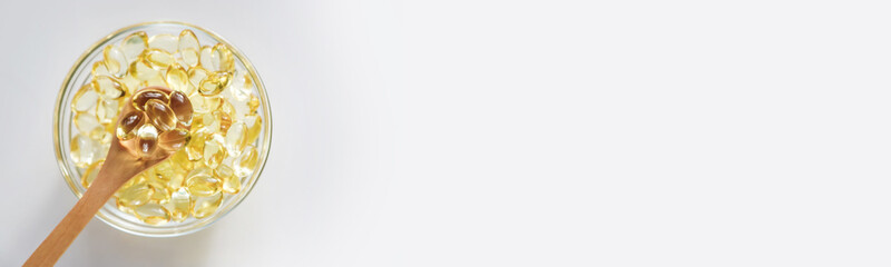 Vitamin E in fat-soluble capsules. Selective focus.