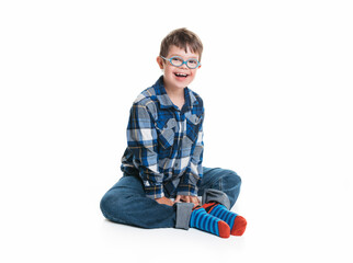 A child boy posing on studio white background