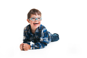 A child boy posing on studio white background