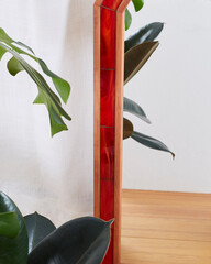 Side detail of Unique Cedar Frame Mirror with Red Glass Tile Border. 