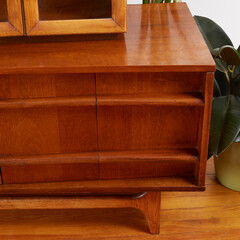 Detail view of display cabinet, Mid-Century Modern, Walnut Credenza and Hutch. Interior photograph...