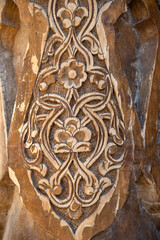 Fragment of an ancient wooden column. Ichan-Kala, Khiva