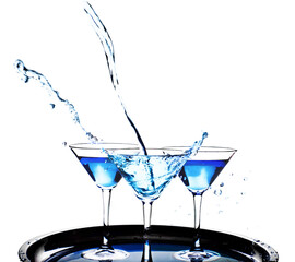Three glasses of martini on white background