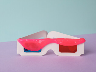 Minimalism still life. 3d glasses with slime on two tone pastel background. Fresh idea. Creative...