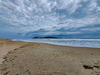 sunset on the beach in Florianópolis
