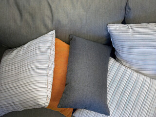Close up gray fabric couch Sofa with colorful backrest pillows, comfortable, relax, rest, cozy,...