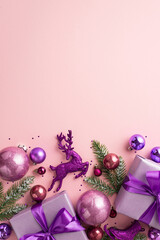 New Year concept. Top view vertical photo of purple gift boxes bows pink violet baubles deer ice...