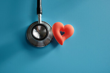 Top view shot of arrangement equipment medical background concept.Red heart & stethoscope.