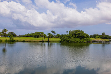 Fototapeta na wymiar Beautiful view of lake and golf courses on island of Aruba.