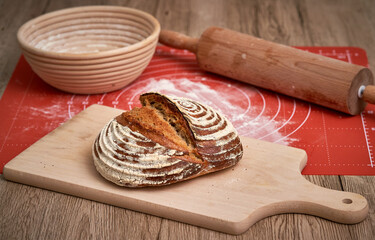 Traditional sourdough bread. Round loaf of freshly backed sourdough bread.