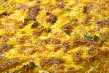 Quiche, a traditional French type of savory pie extreme macro detail closeup