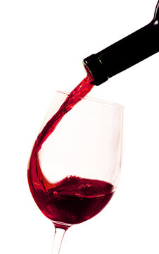 Pouring Red Wine into a Glass - Isolated