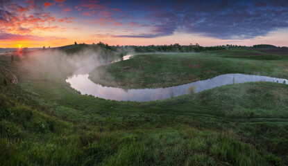 Beautiful spring sunrise over river bank. nature of Ukraine