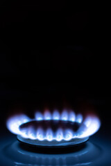Gas burns with blue flames. Gas crisis around the world. Selective focus on the flame. Soft focus...