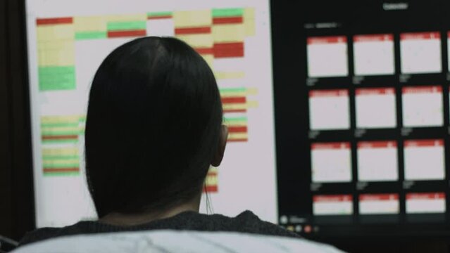 Young Female Office Employee Performs Tasks at Her Desk 4K