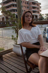 Fototapeta premium Outdoor portrait of a beautiful young woman