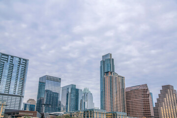 Fototapeta na wymiar Downtown Austin Texas skyline against a backdrop of sky covered with clouds