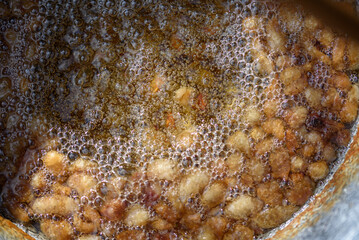 cooking chopped duck or goose fat.