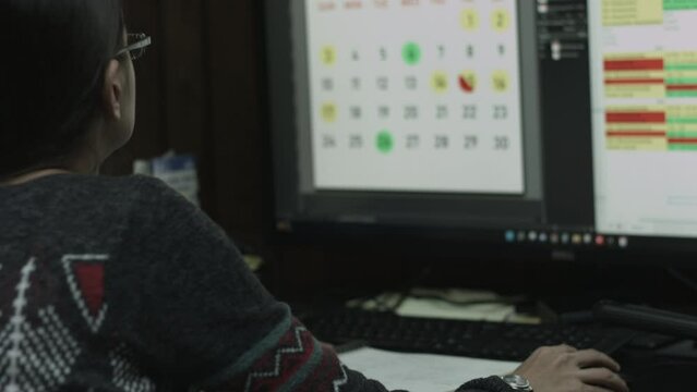 Young Female Office Employee Performs Tasks at Her Desk 4K