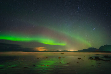 Beautiful colorful northern lights captured in the Lofoten Islands in northern Norway.