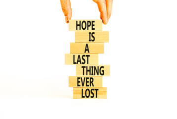 Do not lost hope symbol. Concept words Hope is a last thing ever lost on wooden blocks on a...