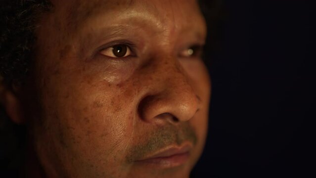 old Maori man portrait in the dark