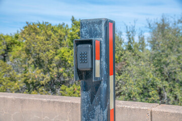Electronic gate lock with key code at the Lake Austin Dam facility in Texas