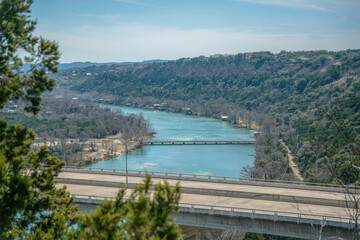 View from Lake Austin Dam of the Colorado River with concrete road bridge