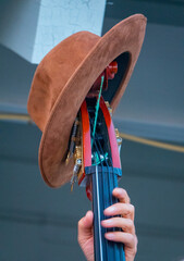 Musician's Hat on top of String Base