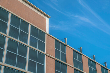 Residential or office building exterior against blue sky in Austin Texas