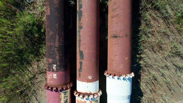 Big transmission pipes in top view. Pipeline connecting countries during the energy crisis.