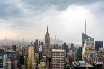 Naklejka na ściany i meble Rainy clouds over the skyscrapers of Manhattan