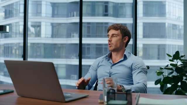 Closeup stressful boss calming down in office. Man meditating at workplace