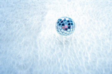 disco ball on white surface