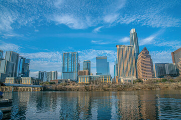 Austin Texas urban landscape with buildings along the calm Colorado River