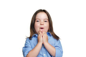 Pretty little girl in a white studio expressing amazement